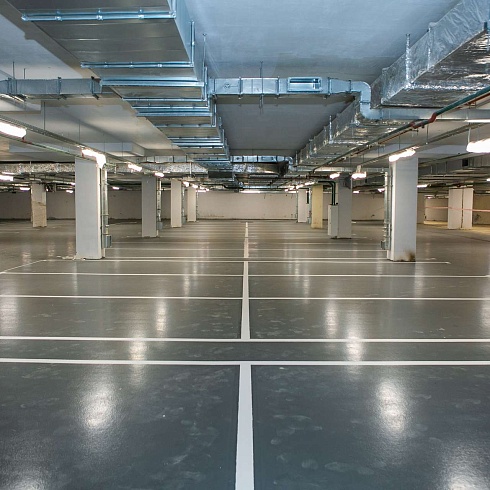 Комплекс работ по устройству бетонных и полимерных полов подземной двухэтажной автомобильной парковки ЖК «Западный порт»